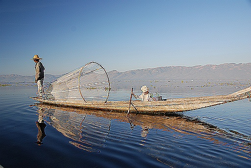 DSC_0584.JPG - A fisherman just  outside of the resort.