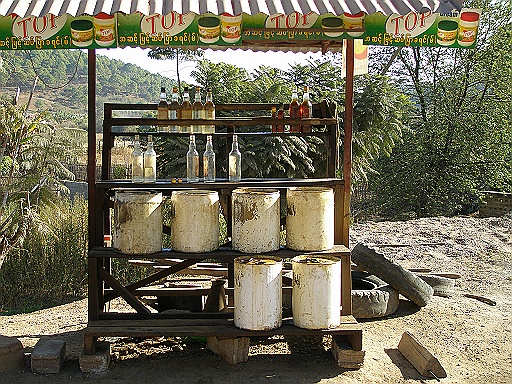 P1130071.JPG - Petrol for sale by the bottle.